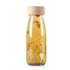 Botella sensorial flotante transparente y dorado Float Bottle - Petit Boum